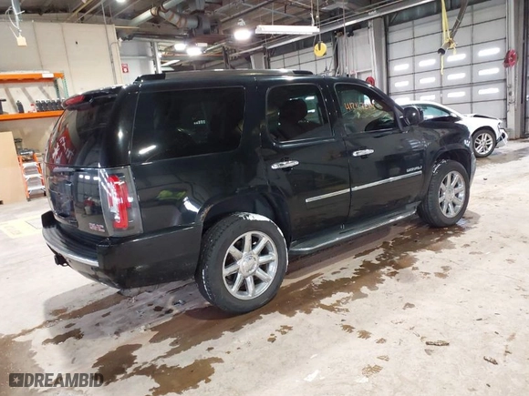 2010 GMC Yukon Denali with VIN 1GKUKEEF1AR287663, listed as a IAAI auction lot 41247274 with 105271 miles. Bid and sale history available at carsss.com. Image 4.