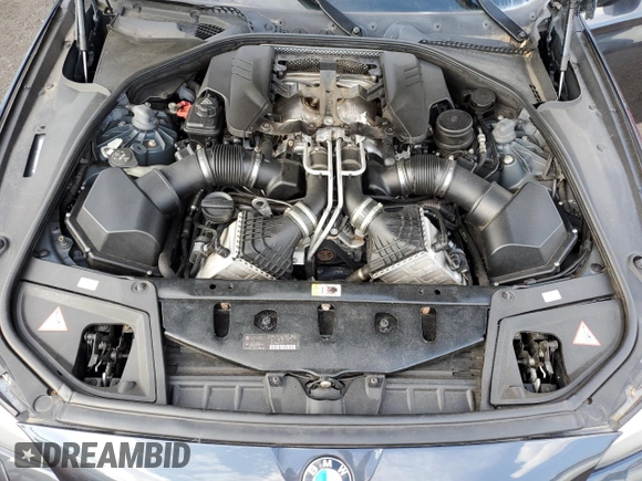 2013 BMW M5 with VIN WBSFV9C5XDD096847, listed as a Copart auction lot 69652454 with 73,632 mi miles and Clean Title. Bid and sale history available at carsss.com. Image 11.