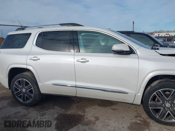 2020 GMC Acadia Denali with VIN 1GKKNXLS8LZ121704, listed as a IAAI auction lot 41665662 with 69,937 mi miles. Bid and sale history available at carsss.com. Image 13.