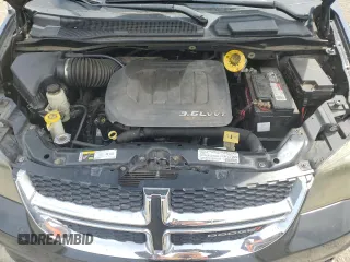 2013 Dodge Grand Caravan Crew with VIN 2C4RDGDG9DR741254, listed as a Copart auction lot 53121095 with 227,243 mi miles and Clean Title. Bid and sale history available at DreamBid. Image 12.