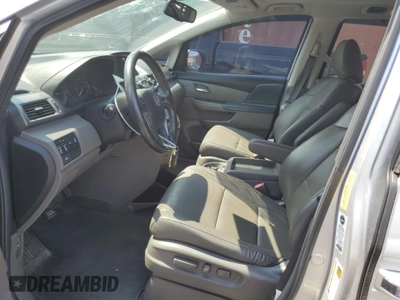 2014 Honda Odyssey EX-L with VIN 5FNRL5H63EB042207, listed as a Copart auction lot 61957605 with 204,563 mi miles and Salvage title. Bid and sale history available at DreamBid. Image 7.