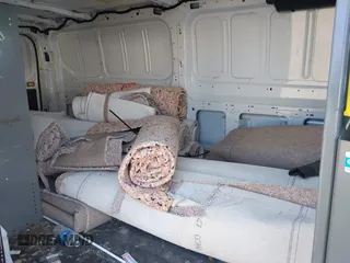 2016 Ford Transit Cargo with VIN 1FTBW2YGXGKA75890, listed as a IAAI auction lot 42072985 with 99,189 mi miles and . Bid and sale history available at DreamBid. Image 8.
