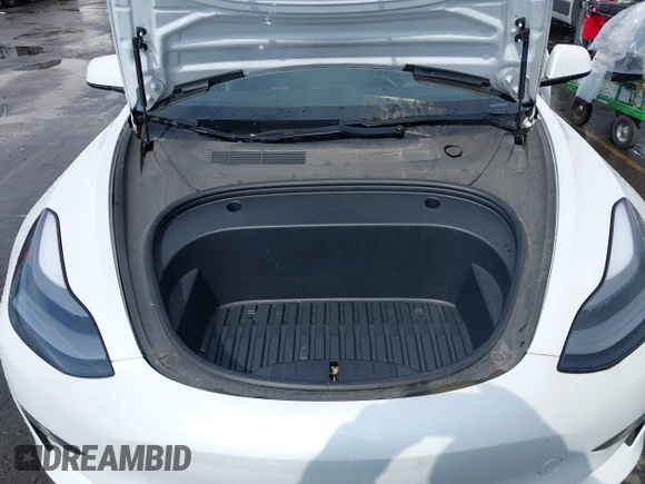 2021 Tesla Model 3 Standard Range Plus z VIN 5YJ3E1EA5MF977437, wystawiony jako IAAI lot #40297512 z przebiegiem 72 039 mil mil oraz . Historia ofert i sprzedaży dostępna na DreamBid. Obrazek 10.