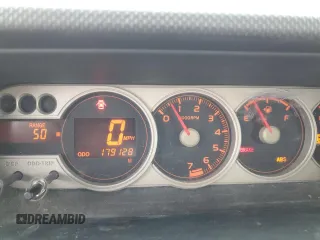 2008 Scion xB z VIN JTLKE50E281008694, wystawiony jako Copart lot #57127285 z przebiegiem 179 128 mil mil oraz Szkoda całkowita • Salvage title. Historia ofert i sprzedaży dostępna na DreamBid. Obrazek 9.