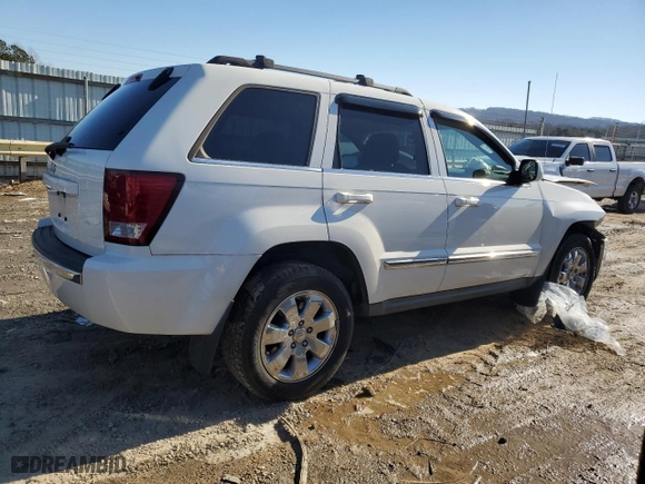 2009 Jeep Grand Cherokee Limited with VIN 1J8GR58K79C527951, listed as a Copart auction lot 87709185 with 148,433 mi miles and Salvage Title. Bid and sale history available at carsss.com. Image 3.