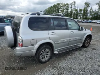 2006 Suzuki XL7 z VIN JS3TX92V564102483, wystawiony jako Copart lot #57185865 z przebiegiem 152 864 mil mil oraz Szkoda całkowita • Salvage title. Historia ofert i sprzedaży dostępna na DreamBid. Obrazek 3.