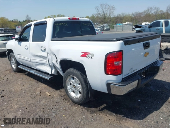 2013 Chevrolet Silverado 1500 LTZ with VIN 3GCPKTE24DG123063, listed as a IAAI auction lot 42061675 with 221,813 mi miles and . Bid and sale history available at DreamBid. Image 3.