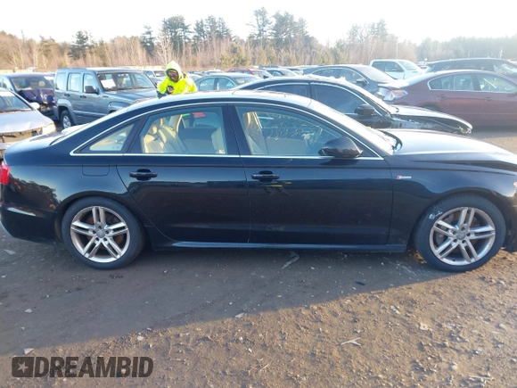 2012 Audi A6 Prestige z VIN WAUHGAFC0CN076036, wystawiony jako IAAI lot #41409687 z przebiegiem 54 601 mil mil oraz . Historia ofert i sprzedaży dostępna na DreamBid. Obrazek 13.