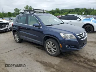 2011 Volkswagen Tiguan SEL z VIN WVGBV7AX2BW534482, wystawiony jako Copart lot #61097265 z przebiegiem 186 282 mil mil oraz Czysty tytuł • Clean title. Historia ofert i sprzedaży dostępna na DreamBid. Obrazek 4.