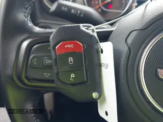 2021 Jeep Wrangler Unlimited Sport z VIN 1C4HJXDG7MW805657, wystawiony jako IAAI lot #42481446 z przebiegiem 24 299 mil mil oraz . Historia ofert i sprzedaży dostępna na DreamBid. Obrazek 11.