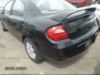 2003 Dodge Neon SXT with VIN 1B3ES56C63D251649, listed as a IAAI auction lot 27562059 with 222,302 mi miles. Bid and sale history available at carsss.com. Image 3.