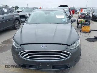 2019 Ford Fusion S with VIN 3FA6P0G79KR215541, listed as a IAAI auction lot 41626638 with 73,751 mi miles and . Bid and sale history available at DreamBid. Image 12.