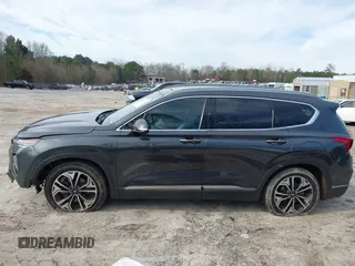 2020 Hyundai Santa Fe Limited with VIN 5NMS53AA2LH301974, listed as a IAAI auction lot 41614588 with 104,621 mi miles. Bid and sale history available at carsss.com. Image 15.