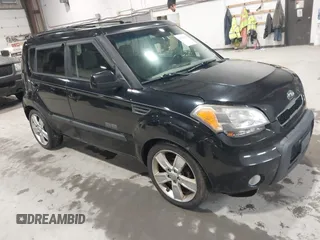 2011 Kia Soul + with VIN KNDJT2A2XB7196479, listed as a IAAI auction lot 41747551 with 205,849 mi miles. Bid and sale history available at carsss.com. Image 1.