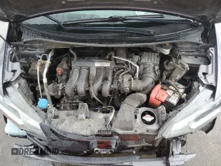 2015 Honda Fit LX с VIN 3HGGK5G59FM731945, выставлен на аукционе Copart как лот 61272285 с пробегом 126 060 миль миль и Списание • Salvage title. История ставок и продаж доступна на DreamBid. Изображение 11.