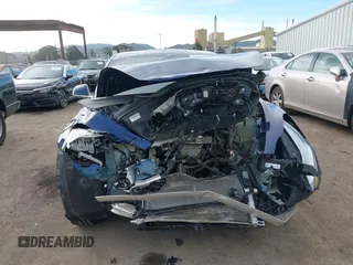 2018 Tesla Model 3 Long Range Battery z VIN 5YJ3E1EA3JF043451, wystawiony jako IAAI lot #41529214 z przebiegiem 65 375 mil mil oraz . Historia ofert i sprzedaży dostępna na DreamBid. Obrazek 6.