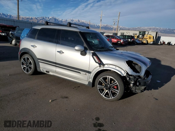 2015 MINI Countryman John Cooper Works with VIN WMWXD1C53FWS34815, listed as a Copart auction lot 74667224 with 94,971 mi miles and Salvage Title. Bid and sale history available at DreamBid. Image 4.