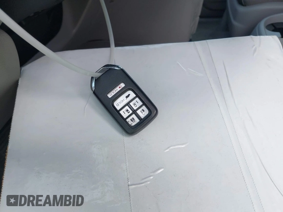 2014 Honda Odyssey EX-L with VIN 5FNRL5H64EB026520, listed as a IAAI auction lot 42562290 with 118,890 mi miles and . Bid and sale history available at DreamBid. Image 11.