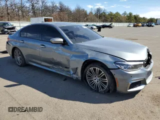 2018 BMW 5 Series M550i xDrive z VIN WBAJB9C55JB036120, wystawiony jako Copart lot #49134865 z przebiegiem Nie podano mil oraz Szkoda całkowita • Salvage title. Historia ofert i sprzedaży dostępna na DreamBid. Obrazek 4.