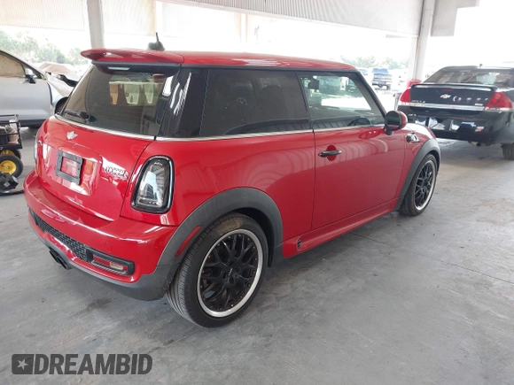 2012 MINI Hardtop S with VIN WMWSV3C55CT387678, listed as a IAAI auction lot 42487337 with 111,965 mi miles and . Bid and sale history available at DreamBid. Image 4.