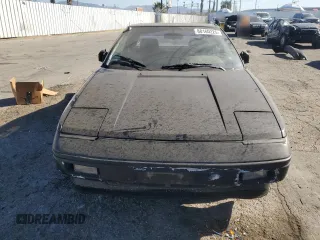 1986 Toyota MR2 z VIN JT2AW15C8G0053673, wystawiony jako Copart lot #88160225 z przebiegiem 165 867 mil mil oraz Szkody całkowita. Historia ofert i sprzedaży dostępna na DreamBid. Obrazek 5.