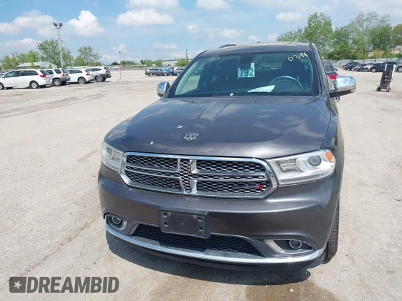 2014 Dodge Durango Citadel with VIN 1C4RDJEG0EC978611, listed as a IAAI auction lot 42250344 with 200,412 mi miles and . Bid and sale history available at DreamBid. Image 13.