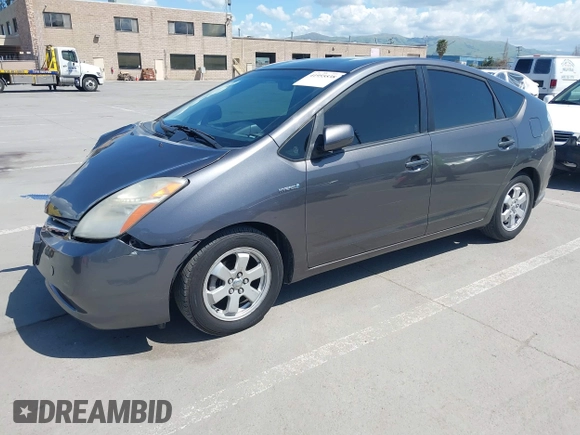 2007 Toyota Prius z VIN JTDKB20U273215633, wystawiony jako IAAI lot #41955538 z przebiegiem 172 957 mil mil oraz . Historia ofert i sprzedaży dostępna na DreamBid. Obrazek 18.