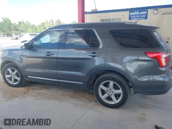 2018 Ford Explorer XLT with VIN 1FM5K7DH4JGB39495, listed as a IAAI auction lot 41941964 with 99,879 mi miles and . Bid and sale history available at DreamBid. Image 14.