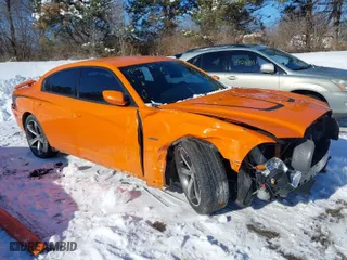 2014 Dodge Charger SXT with VIN 2C3CDXHG1EH219486, listed as a IAAI auction lot 41262265 with 117,949 mi miles. Bid and sale history available at carsss.com. Image 1.
