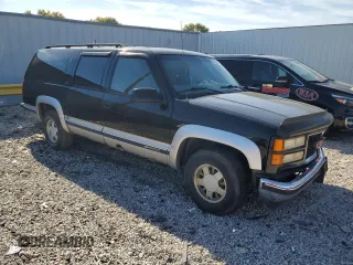 1997 GMC Suburban z VIN 3GKEC16R7VG500916, wystawiony jako Copart lot #76617314 z przebiegiem 271 867 mil mil oraz Nie do naprawy • Non repairable. Historia ofert i sprzedaży dostępna na DreamBid. Obrazek 4.