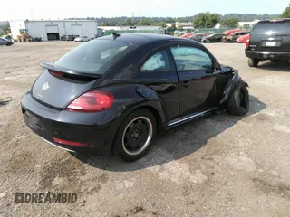 2018 Volkswagen Beetle S z VIN 3VWFD7ATXJM705321, wystawiony jako IAAI lot #40118047 z przebiegiem Nie podano mil oraz . Historia ofert i sprzedaży dostępna na DreamBid. Obrazek 4.