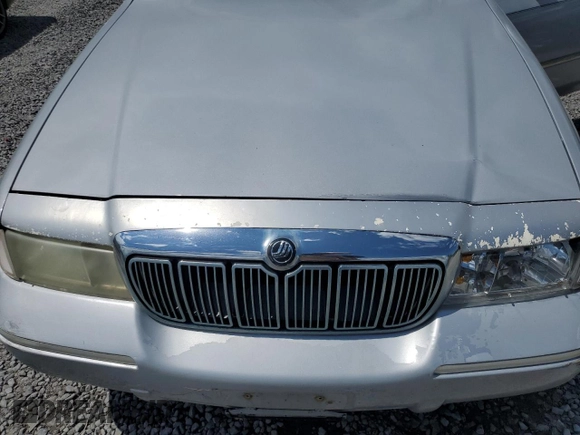 2000 Mercury Grand Marquis LS z VIN 2MEFM75W8YX614309, wystawiony jako Copart lot #61229915 z przebiegiem 228 527 mil mil oraz Szkoda całkowita • Salvage title. Historia ofert i sprzedaży dostępna na DreamBid. Obrazek 11.
