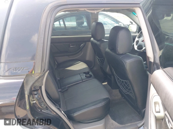 2003 Subaru Baja with VIN 4S4BT61C137104712, listed as a IAAI auction lot 42144458 with 74,721 mi miles and . Bid and sale history available at DreamBid. Image 8.