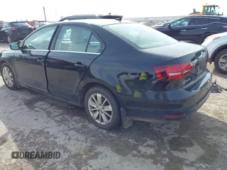 2016 Volkswagen Jetta Sedan 1.4T SE with VIN 3VWD67AJ3GM390273, listed as a IAAI auction lot 41575074 with 114,705 mi miles. Bid and sale history available at carsss.com. Image 3.