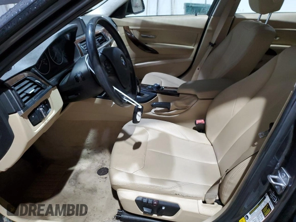 2015 BMW 3 Series 320i xDrive with VIN WBA3C3C52FP664472, listed as a Copart auction lot 55647585 with 129,934 mi miles and Salvage title. Bid and sale history available at DreamBid. Image 7.