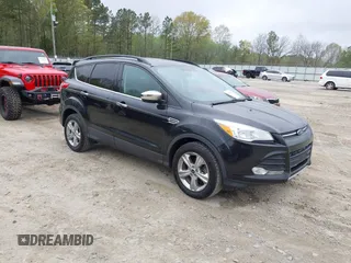 2015 Ford Escape SE with VIN 1FMCU0GX3FUC73452, listed as a IAAI auction lot 41923211 with 140,952 mi miles. Bid and sale history available at carsss.com. Image 1.