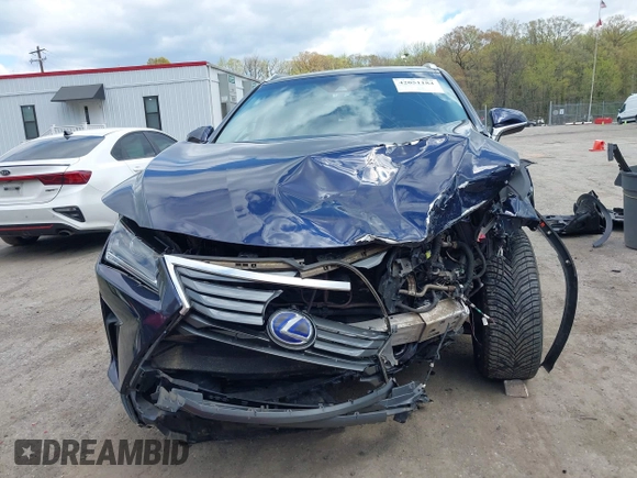 2016 Lexus RX 450h with VIN 2T2BGMCA1GC001086, listed as a IAAI auction lot 42051184 with 65,485 mi miles and . Bid and sale history available at DreamBid. Image 12.