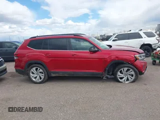 2021 Volkswagen Atlas SE z VIN 1V2HR2CAXMC574861, wystawiony jako IAAI lot #42139105 z przebiegiem 61 098 mil mil oraz . Historia ofert i sprzedaży dostępna na DreamBid. Obrazek 13.