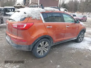 2013 Kia Sportage EX z VIN KNDPCCA22D7392791, wystawiony jako IAAI lot #41362982 z przebiegiem 90 361 mil mil oraz . Historia ofert i sprzedaży dostępna na DreamBid. Obrazek 4.