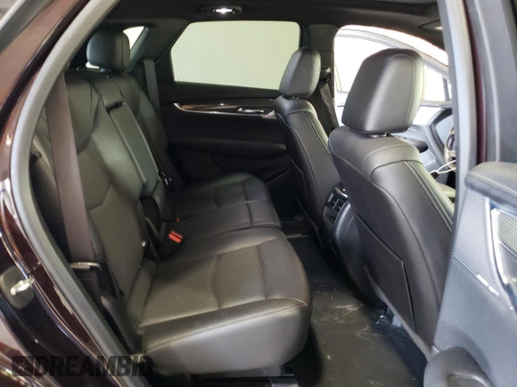 2021 Cadillac XT5 AWD Sport z VIN 1GYKNGRS5MZ165836, wystawiony jako Copart lot #77872264 z przebiegiem 46 065 mil mil oraz Szkoda całkowita • Salvage title. Historia ofert i sprzedaży dostępna na DreamBid. Obrazek 11.