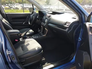 2017 Subaru Forester Touring with VIN JF2SJGWC5HH567870, listed as a IAAI auction lot 42007542 with 76,560 mi miles. Bid and sale history available at carsss.com. Image 5.