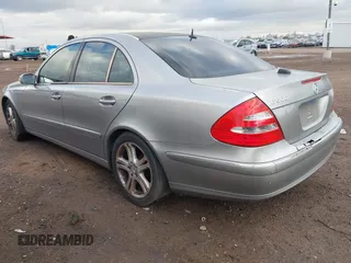 2004 Mercedes-Benz E-Class 5.0L with VIN WDBUF70J14A522118, listed as a IAAI auction lot 41786440 with 153,325 mi miles. Bid and sale history available at carsss.com. Image 3.