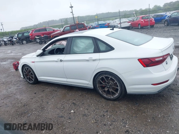 2020 Volkswagen Jetta GLI S z VIN 3VW5T7BU9LM091404, wystawiony jako IAAI lot #42300830 z przebiegiem 46 851 mil mil oraz . Historia ofert i sprzedaży dostępna na DreamBid. Obrazek 14.