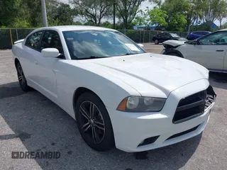 2014 Dodge Charger SXT z VIN 2C3CDXJG8EH339862, wystawiony jako IAAI lot #42373763 z przebiegiem 171 009 mil mil oraz . Historia ofert i sprzedaży dostępna na DreamBid. Obrazek 1.