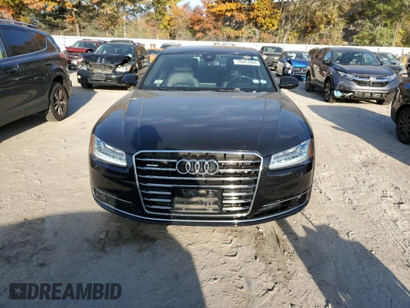 2015 Audi A8 z VIN WAUJGAFD7FN032176, wystawiony jako Copart lot #76943904 z przebiegiem 126 423 mil mil oraz Czysty tytuł • Clean title. Historia ofert i sprzedaży dostępna na DreamBid. Obrazek 5.
