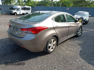 2013 Hyundai Elantra Limited z VIN 5NPDH4AE5DH245137, wystawiony jako IAAI lot #42372752 z przebiegiem 80 356 mil mil oraz . Historia ofert i sprzedaży dostępna na DreamBid. Obrazek 4.