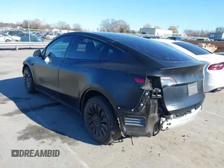 2022 Tesla Model Y Long Range with VIN 7SAYGDEEXNF424856, listed as a IAAI auction lot 41059718 with 44,439 mi miles and . Bid and sale history available at carsss.com. Image 3.
