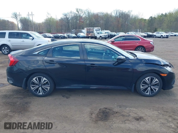2017 Honda Civic EX-L z VIN 2HGFC1F72HH647147, wystawiony jako IAAI lot #42064784 z przebiegiem 139 893 mil mil oraz . Historia ofert i sprzedaży dostępna na DreamBid. Obrazek 13.