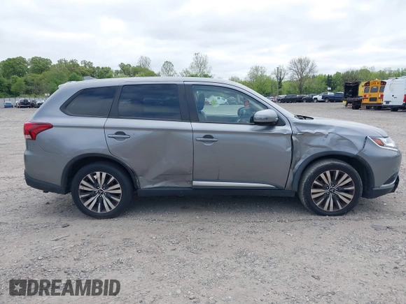 2020 Mitsubishi Outlander SE z VIN JA4AD3A37LZ044719, wystawiony jako IAAI lot #39303659 z przebiegiem 86 662 mil mil oraz . Historia ofert i sprzedaży dostępna na DreamBid. Obrazek 12.