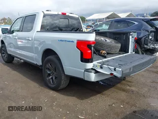 2023 Ford F-150 Lightning Pro with VIN 1FTVW1EV3PWG60491, listed as a IAAI auction lot 41507485 with 19,148 mi miles and . Bid and sale history available at DreamBid. Image 3.